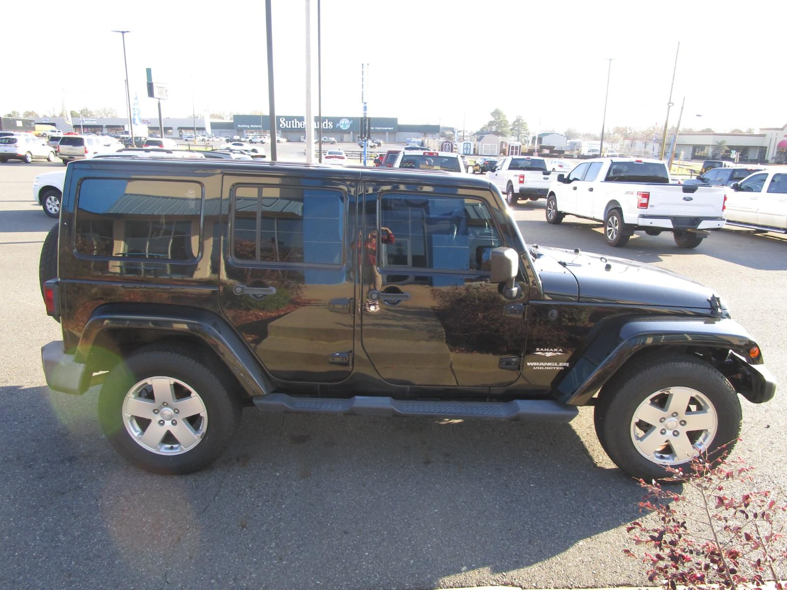 2012 BLACK Jeep Wrangler WRANGLER UNLIMITED (1C4BJWEG8CL) , located at 1814 Albert Pike Road, Hot Springs, AR, 71913, (501) 623-1717, 34.494228, -93.094070 - Photo #2